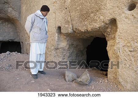 Stock Image - Shell Inside The Niche Of The Large Buddha, All What Was Left After The 2001 Destruction Of Bamiyan By The Taliban Is A Shell Casing., Bamian Province, Afghanistan. Fotosearch