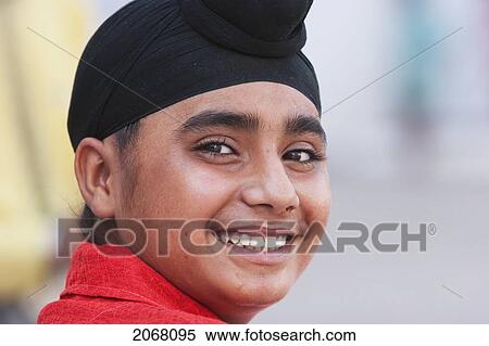 Stock Photography - Sikh Boy At The Gurdwara Har Mandir Shahib, Patna, Bihar, India. Fotosearch