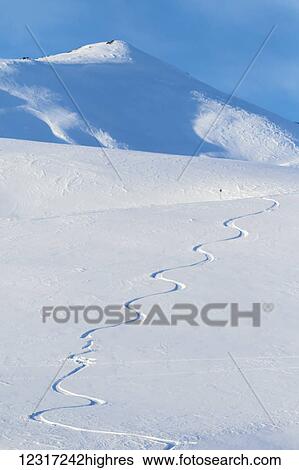 Stock Photograph - Ski tracks in Hatcher Pass, an important and popular ski area as it normally receives a lot of snow, South-central Alaska; Alaska, United States of America. Fotosearch