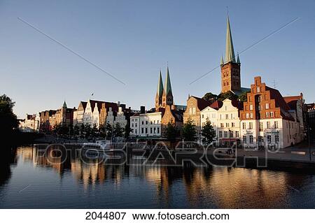 Skyline Reflected In The Holstenhafen, Lubeck, Germany View Large Photo Image Stock Photo - Skyline Reflected In The Holstenhafen, Lubeck, Germany. Fotosearch