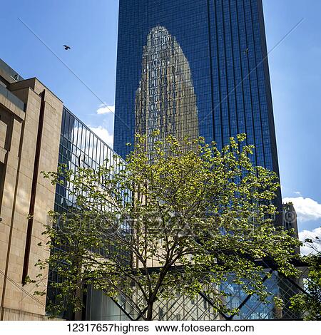 Skyscraper with an image projected on the facade; Minneapolis, Minnesota, United States of America View Large Photo Image Stock Photograph - Skyscraper with an image projected on the facade; Minneapolis, Minnesota, United States of America. Fotosearch