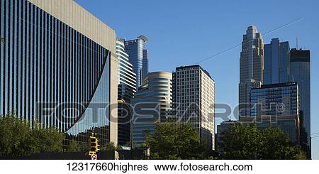 Stock Photograph - Skyscrapers against a blue sky; Minneapolis, Minnesota, United States of America. Fotosearch