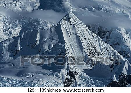 Snow covered peaks of the Antarctic mountains, Wilhelmina Bay, Antarctic Peninsula; Antarctica View Large Photo Image Stock Photograph - Snow covered peaks of the Antarctic mountains, Wilhelmina Bay, Antarctic Peninsula; Antarctica. Fotosearch