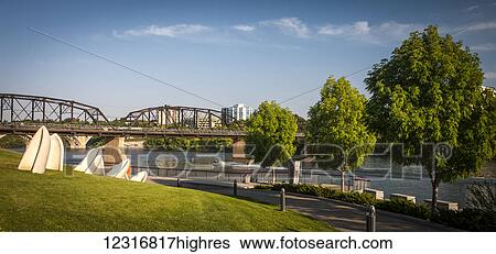 South Saskatchewan River with bridge and promenade; Saskatoon, Saskatchewan, Canada View Large Photo Image Stock Photograph - South Saskatchewan River with bridge and promenade; Saskatoon, Saskatchewan, Canada. Fotosearch