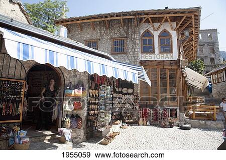 Stock Photo - Souvenir Seller At The Old Bridge Area In Mostar, Herzegovina-Neretva, Bosnia And Herzegovina. Fotosearch