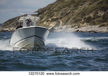 Speedboat splashing water along the coastline; Martha's Vineyard, Massachusetts, United States of America View Large Photo Image Stock Image - Speedboat splashing water along the coastline; Martha's Vineyard, Massachusetts, United States of America. Fotosearch