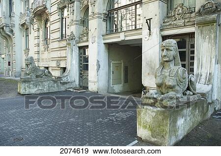 Sphinxes In Front Of The Art Nouveau Building Designed By Mikhail Eisenstein On 2A Alberta Street, Riga, Latvia View Large Photo Image Stock Photo - Sphinxes In Front Of The Art Nouveau Building Designed By Mikhail Eisenstein On 2A Alberta Street, Riga, Latvia. Fotosearch