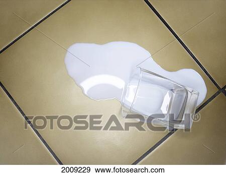 Spilled Glass Of Milk On Tile Floor View Large Photo Image Stock Photo - Spilled Glass Of Milk On Tile Floor. Fotosearch