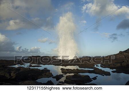 Stock Photograph - Spouting Horn, a Hawaiian Heritage site near Poipu; Lawai, Kauai, Hawaii, United States of America. Fotosearch