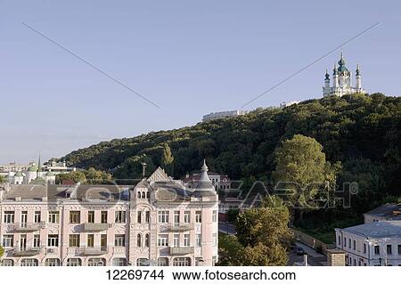 Picture - St Andrew's church (on hill) seen from the Lower Town (Podil); Kiev, Ukraine. Fotosearch