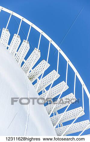 Stock Photograph - Stairs in the blue sky; Turner Valley, Alberta, Canada. Fotosearch