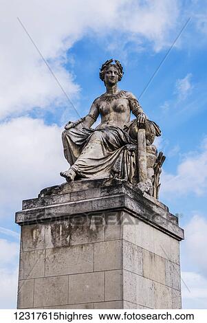 Stock Photograph - Statue of a beautiful woman; Paris, France. Fotosearch
