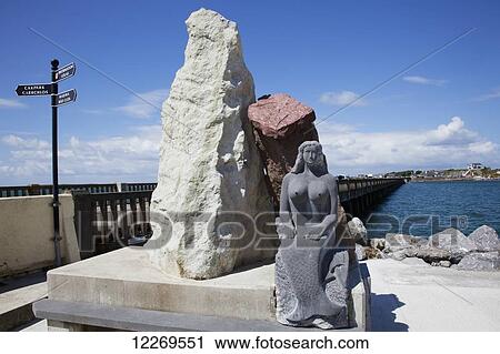 Statue of a mermaid sitting at the water's edge; Fenit, County Kerry, Ireland View Large Photo Image Stock Image - Statue of a mermaid sitting at the water's edge; Fenit, County Kerry, Ireland. Fotosearch