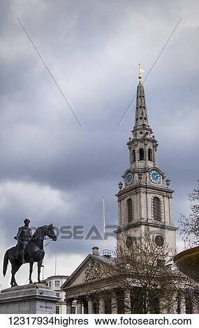 Stock Photograph - Statue of King George IV in front of St Martin-in-the-Fields Church in Trafalgar Square, Westminster; London, England. Fotosearch