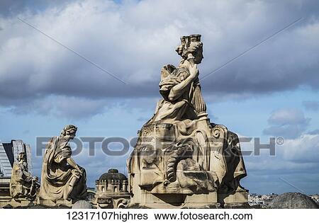 Stock Photograph - Statues on the rooftop of the Musee d'Orsay; Paris, France. Fotosearch