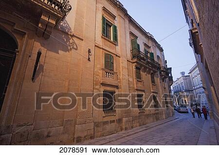 Stone Houses On A Narrow Street, Mdina, Malta View Large Photo Image Stock Image - Stone Houses On A Narrow Street, Mdina, Malta. Fotosearch