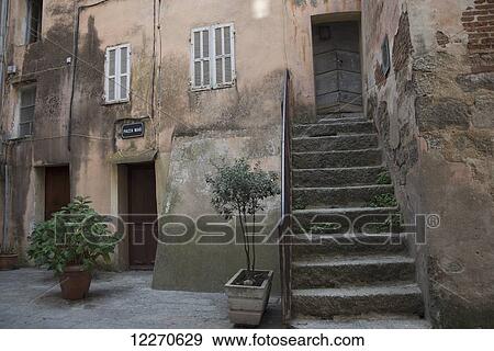 Stock Photo - Stone stairway, building and courtyard in the historical area of Corte; Corte, Corse-du-Sud, Corsica, France. Fotosearch