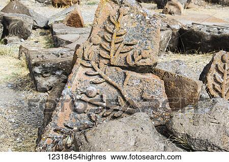 Stones with bas-reliefs among the ruins of Zvartnots Cathedral; Vagharshapat, Armavir Province, Armenia View Large Photo Image Stock Photograph - Stones with bas-reliefs among the ruins of Zvartnots Cathedral; Vagharshapat, Armavir Province, Armenia. Fotosearch