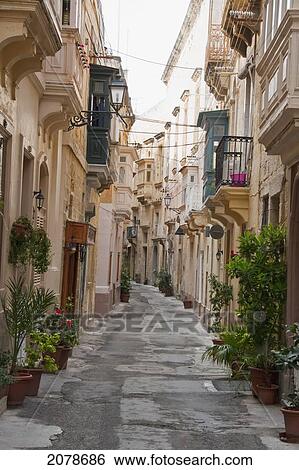 Street Scene Featuring Houses With Enclosed Balconies, Vittoriosa (Birgu), Malta View Large Photo Image Stock Photograph - Street Scene Featuring Houses With Enclosed Balconies, Vittoriosa (Birgu), Malta. Fotosearch