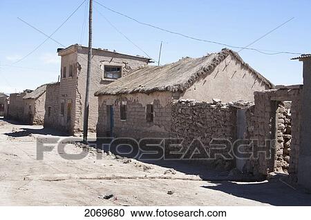 Stock Image - Street Scene With Adobe Houses, Colchani, Potosi Department, Bolivia. Fotosearch