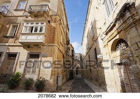 Street Scene With An Enclosed Balcony On A House, Vittoriosa (Birgu), Malta View Large Photo Image Stock Image - Street Scene With An Enclosed Balcony On A House, Vittoriosa (Birgu), Malta. Fotosearch