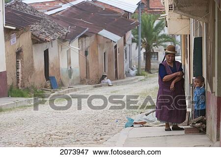 Stock Photo - Street Scene With Aymara Woman And Boy, Coroico, La Paz Department, Bolivia. Fotosearch