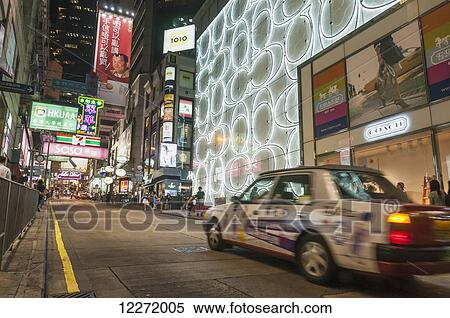 Street scene with pedestrians and bright neon signs at nighttime; Hong Kong Island, China View Large Photo Image Stock Photography - Street scene with pedestrians and bright neon signs at nighttime; Hong Kong Island, China. Fotosearch
