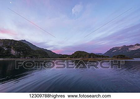 Stock Photograph - Sunrise over Geographical Bay; Alaska, United States of America. Fotosearch