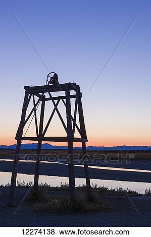 Stock Photo - Sunrise over the wooden church bell tower along the banks of the Noatak River, Noatak, Arctic Alaska, USA, Fall . Fotosearch