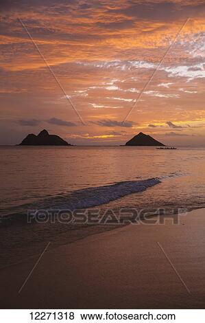 Sunset at Lanikai Beach, with Mokuluas islands in the background; Oahu, Hawaii, United States of America View Large Photo Image Stock Photo - Sunset at Lanikai Beach, with Mokuluas islands in the background; Oahu, Hawaii, United States of America. Fotosearch