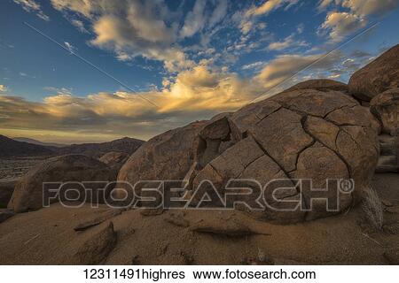 Sunset over the large rounded boulders in Richtersveld National Park; South Africa View Large Photo Image Stock Photograph - Sunset over the large rounded boulders in Richtersveld National Park; South Africa. Fotosearch