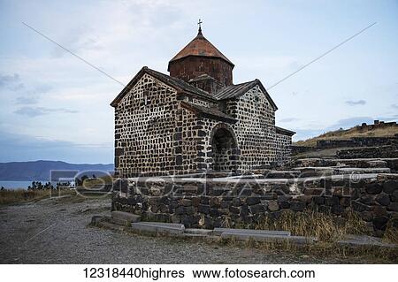 Stock Photograph - Surp Astvatsatsin (Holy Mother of God Church) of the Sevanavank (Sevank Monastery) overlooking Lake Sevan; Gegharkunik Province, Armenia. Fotosearch