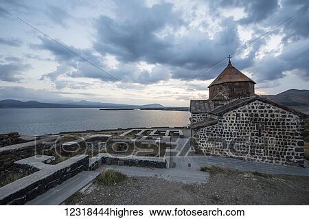 Stock Photograph - Surp Astvatsatsin (Holy Mother of God Church) of the Sevanavank (Sevank Monastery) overlooking Lake Sevan; Gegharkunik Province, Armenia. Fotosearch