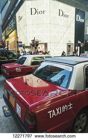 Stock Photo - Taxis on the street; Kowloon, Hong Kong, China. Fotosearch
