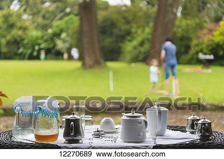 Stock Photo - Tea and croquet at Huntingdon House, Satemwa Tea Estate; Thyolo, Malawi. Fotosearch