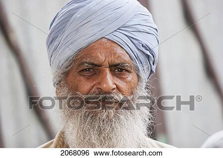 Stock Photograph - Temple Guard At Gurdwara Har Mandir Shahib, Patna, Bihar, India. Fotosearch
