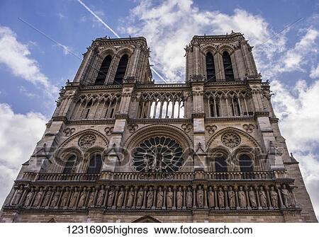 The bell towers of Notre Dame de Paris against a bright spring sky; Paris, France View Large Photo Image Stock Photograph - The bell towers of Notre Dame de Paris against a bright spring sky; Paris, France. Fotosearch