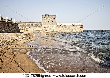 Stock Photograph - The end of the Great Wall of China known as Old Dragon's Head; Shenhaiguan, China. Fotosearch