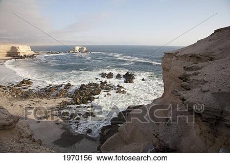 The Natural Monument Of La Portada De Antofagasta, As Seen From The Surrounding Sandstone Cliffs, Antofagasta Region, Chile View Large Photo Image Stock Photograph - The Natural Monument Of La Portada De Antofagasta, As Seen From The Surrounding Sandstone Cliffs, Antofagasta Region, Chile. Fotosearch
