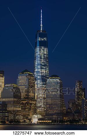 Stock Photo - The new World Trade Center at twilight, viewed from Jersey City, New Jersey; New York City, New York, United States of America. Fotosearch