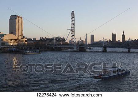 The River Thames in Central London with the London Eye, Houses of Parliament, Big Ben and South Bank, including the Royal Festival Hall and Hayward Gallery; London, England View Large Photo Image Picture - The River Thames in Central London with the London Eye, Houses of Parliament, Big Ben and South Bank, including the Royal Festival Hall and Hayward Gallery; London, England. Fotosearch