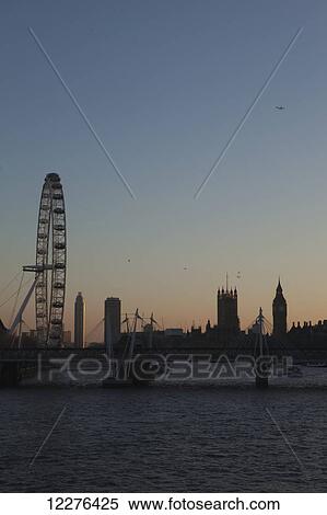 Stock Photography - The River Thames in Central London with the London Eye, Houses of Parliament, Big Ben and South Bank, including the Royal Festival Hall and Hayward Gallery; London, England. Fotosearch