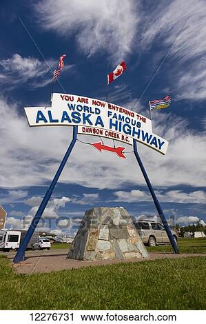 Stock Image - The World Famous Alaska Highway sign, Dawson Creek, British Columbia, Canada, Summer . Fotosearch