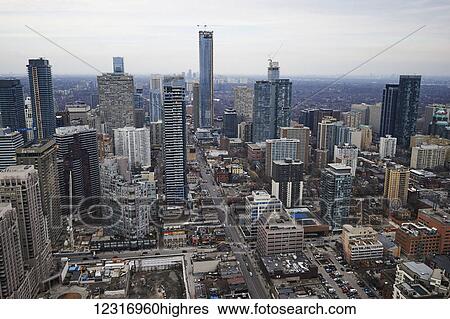 Stock Photograph - Toronto downtown, looking North from Yonge and College Street from a crane; Toronto, Ontario, Canada. Fotosearch