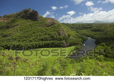 Stock Photograph - Tour boats going to 'The Fern Grotto' Wailua River; Wailua, Kauai, Hawaii, United States of America. Fotosearch