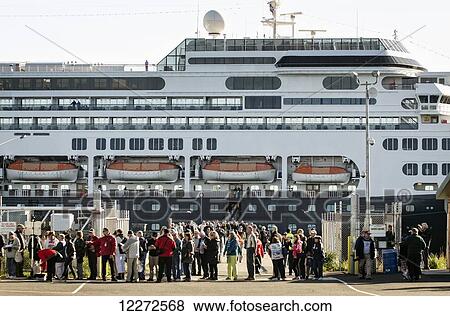 Tourists disembark a Holland America cruise ship at the Homer dock, Southcentral Alaska, Autumn View Large Photo Image Stock Photo - Tourists disembark a Holland America cruise ship at the Homer dock, Southcentral Alaska, Autumn. Fotosearch