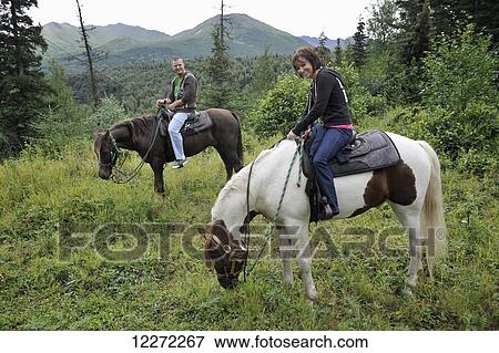 Tourists on a trail ride with Horse Trekkin Alaska in Far North Bicennentenial Park Anchorage, Southcentral Alaska View Large Photo Image Stock Photo - Tourists on a trail ride with Horse Trekkin Alaska in Far North Bicennentenial Park Anchorage, Southcentral Alaska. Fotosearch
