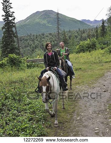 Tourists on a trail ride with Horse Trekkin Alaska in Far North Bicennentenial Park Anchorage, Southcentral Alaska View Large Photo Image Stock Photo - Tourists on a trail ride with Horse Trekkin Alaska in Far North Bicennentenial Park Anchorage, Southcentral Alaska. Fotosearch