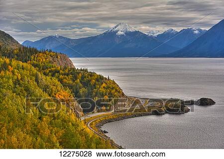 Stock Photo - Traffic on the Seward Highway along Turnagain Arm section of the Cook Inlet on a Fall day in South Central Alaska, HDR. Fotosearch