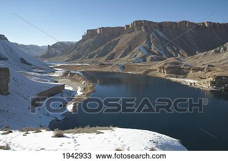 Stock Image - Travertine Walls Of Dam & Qadamjoy Shah-I-Aulia Shrine Beside The Band-I-Haibat (Dam Of Awe), Band-I-Amir, Bamian Province, Afghanistan. Fotosearch